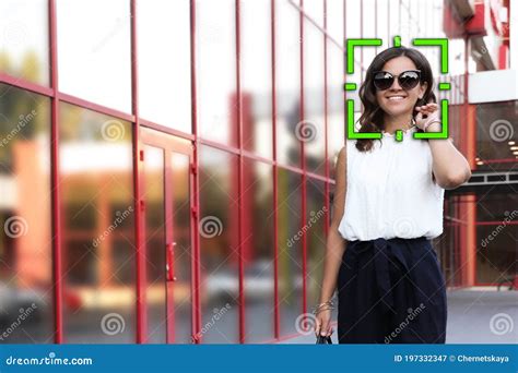 Facial Recognition System Identifying Woman On City Street Stock Image