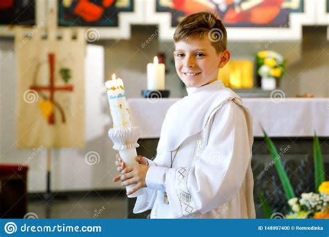 Australians are calling for people to hold a candle at the end of their driveways. Little Kid Boy Receiving His First Holy Communion. Happy ...