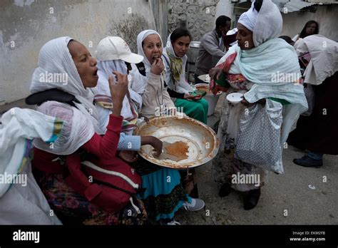 Ethiopian Orthodox Christian Pilgrims Eating At Deir El Sultan