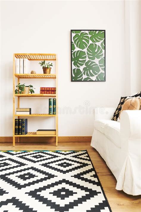 White Bookcase Fireplace And Window With Plants Set In A Modern Living