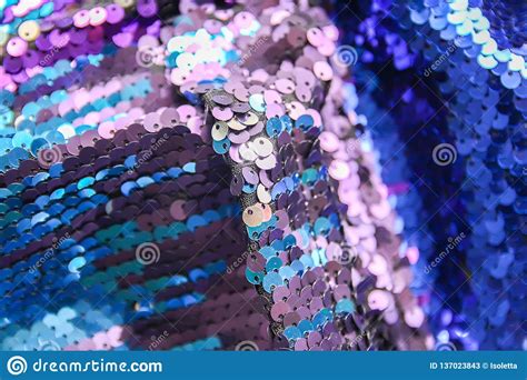 Bright Shiny Texture Of Colorful Sequins In Blue And