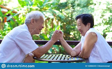 Asian Senior Couple Play Together Happy Game Of Relationship Stock