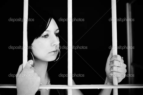 Female Criminal Behind Bars Stock Photo By ©muro 29156385