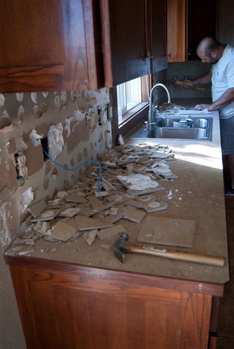 Want to learn how to tile a backsplash? DIY Concrete Counters Poured over Laminate | Averie Lane ...
