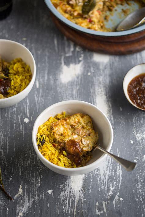 Traditional South African Bobotie Recipe With Fragrant Yellow Rice Drizzle And Dip
