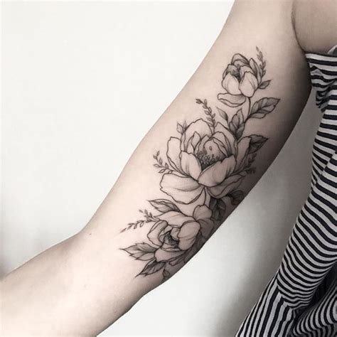 Upper arm tattoos have a lot of room to add multiple elements. Pin by Amy Adam on Tattoos | Bicep tattoo, Bicep tattoo ...