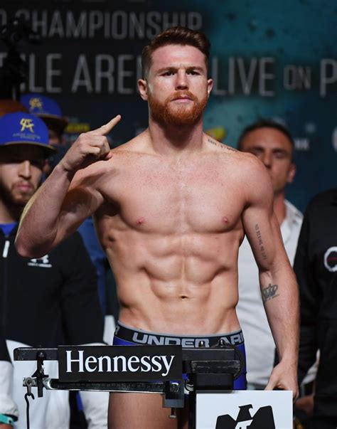 Boxer Canelo Alvarez Poses On The Scale During His Official Weigh In Canelo Alvarez Saul