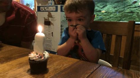 Kid Blowing Out Candles  Blowing Out Candles S Tenor