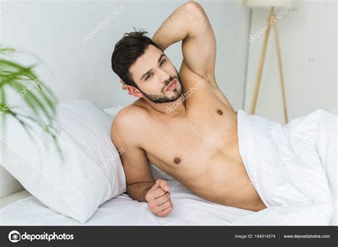 Handsome Shirtless Man Relaxing White Bed Stock Photo By AllaSerebrina