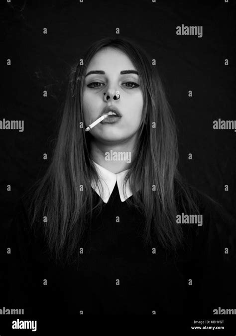 Young Brunette Woman Smoking Cigarette Black And White Stock Photos