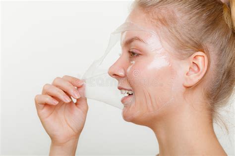 woman removing facial peel off mask stock image image of applying face 95560347