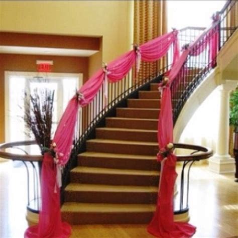 Outdoor indian wedding ceremony with lake view. Pink draped staircase #drapery #wedding | Stair decor ...