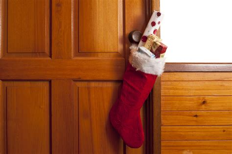 Photo Of Full Festive Red Christmas Stocking On A Wood Door Free Christmas Images