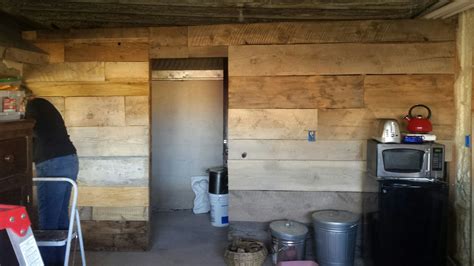 This moves the kitchen further into the room, so more headroom is created. This is the wood wall we constructed for our new pantry ...