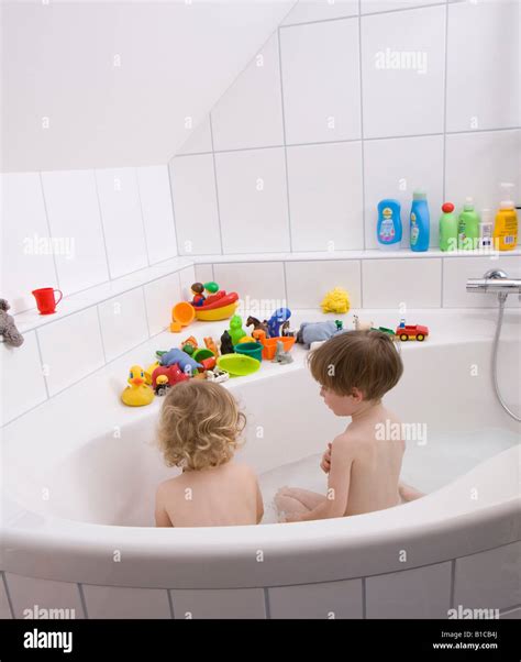 Little Children Playing In The Bath Tub Stock Photo 18097202 Alamy