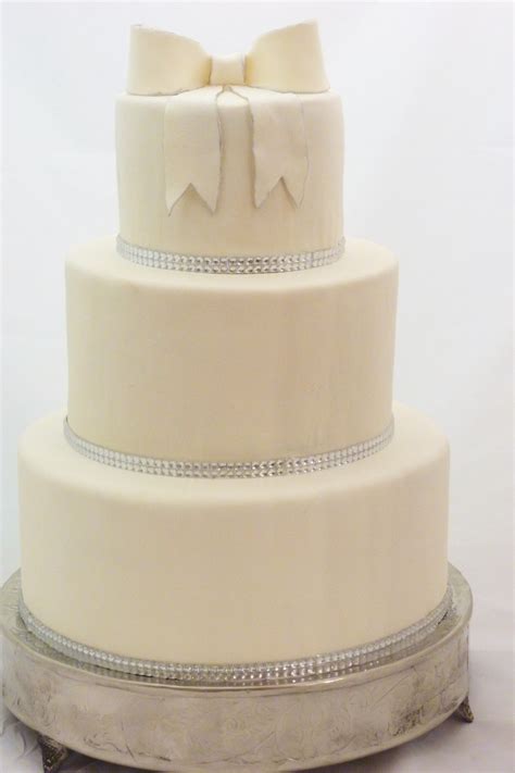 Elegant Round Wedding Cake With Fondant Silver Trim And Rhinestones