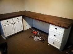 Use kitchen cabinets throughout your house cleverly. DIY Built-in Desk using kitchen cabinets after cutting off ...