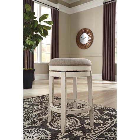 Signature Design By Ashley Realyn Counter Height Upholstered Swivel Stool Sheely S Furniture