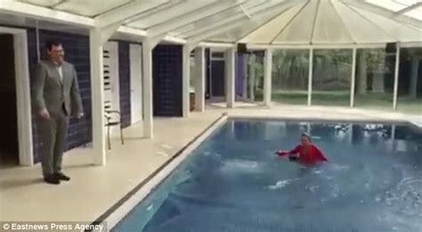 Video Shows Estate Agent Being Pushed In A Swimming Pool By Colleague
