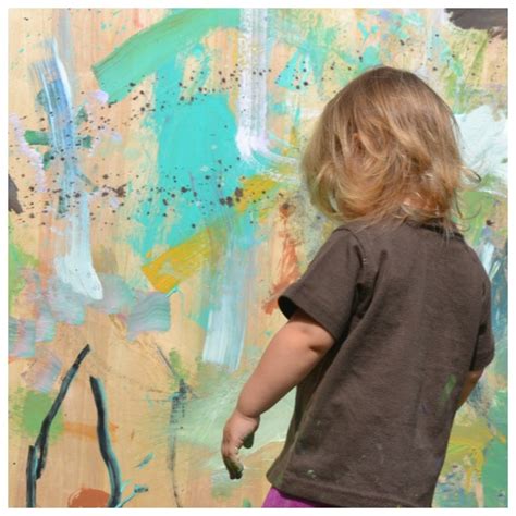 Messy Painting With Kids Acrylic Paint Outdoors On A Wooden Board