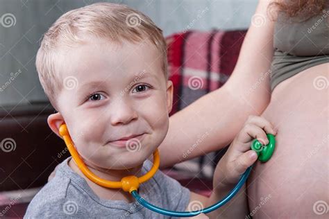 Son Plays With Pregnant Mom Stock Image Image Of Attention Birth