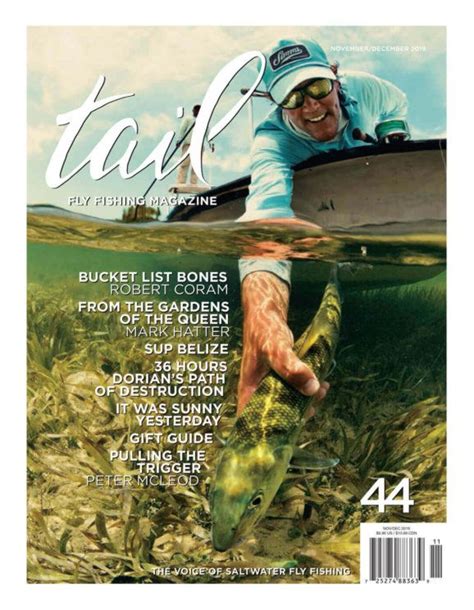 A Magazine Cover With A Man Holding A Fish In Its Hand And The Words Talk