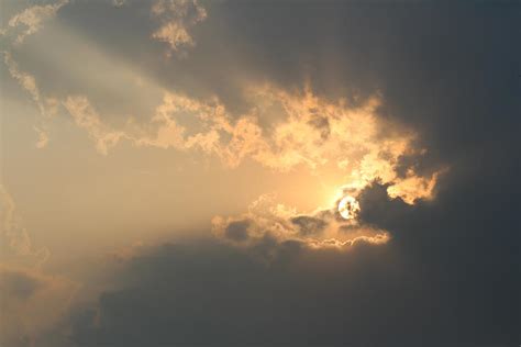 Sun Behind Clouds Satara Photograph By Jennifer Mazzucco Fine Art