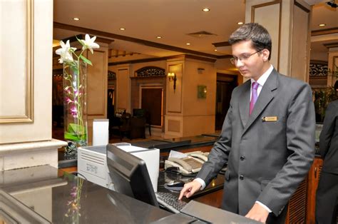 Hotel Management Trainee Working At The Front Desk At The Flickr