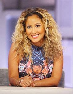 Adrienne bailon's sexy updo is the perfect look for a casual summer evening.1. Curly hair