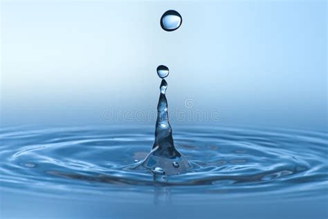 Clean Blue Drop Of Water Splashing In Clear Water Stock Image Image