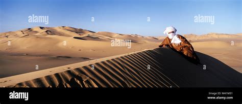 Libya The Sahara Tuareg Guide In The Erg Tarziwouli Stock Photo Alamy