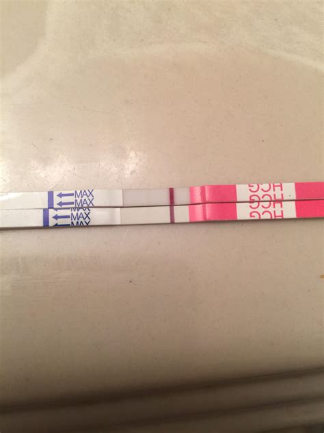 14 DPO faint lines. I was supposed to start my period today. Does this
