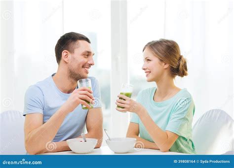 Smiling Couple Having Breakfast At Home Stock Photo Image Of Health