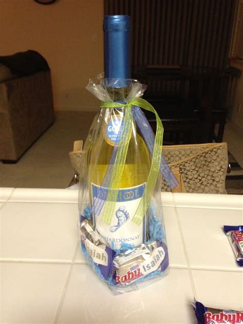 Throwing a coed baby shower for guys and girls is a fun way to celebrate mom and dad as they start their parenthood journey together. Baby shower prizes - bare foot wine and baby Ruth's with a ...