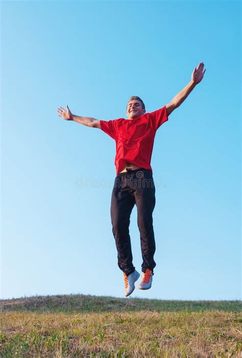 Man Jump From Ground Above Blue Sky Freedom Life Stock Photo Image
