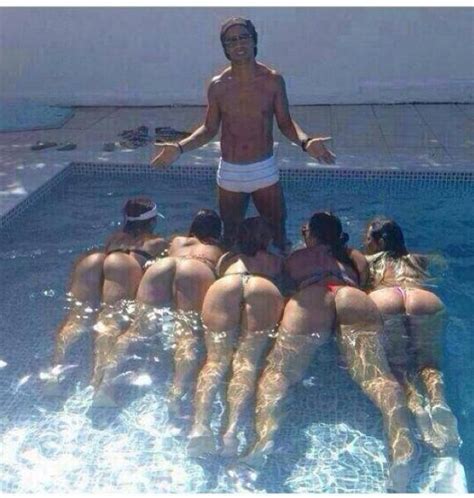 Brazilian Soccer Player Ronaldinho In His Pool With 5