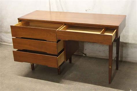 You can also have a detachable hutch organizer with 1 shelf, 2 small drawers and 3 enclosed cubes. Stanley Furniture Mid Century Modern 4 Drawer Wooden Desk ...