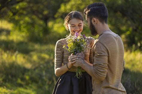 Man Giving Flowers To His Girlfriend Stock Image Image Of Attractive