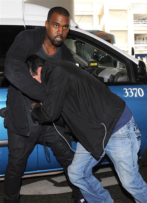Kanye West Charged In Paparazzi Incident