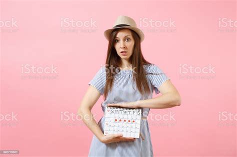 Portrait Sad Illness Woman In Blue Dress Holding Periods Calendar For