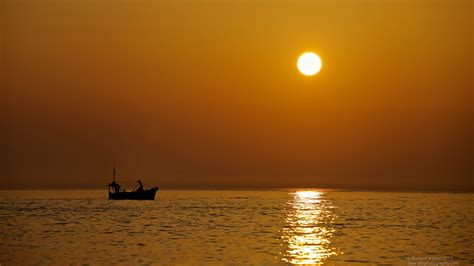 Silhouette Of Boat On Sea During Golden Hour St Ives Hd Wallpaper