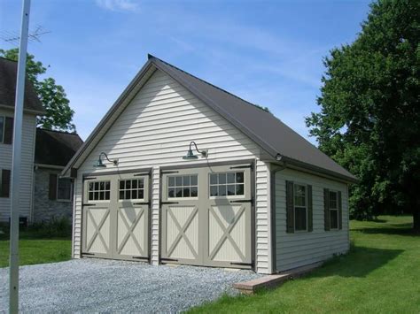 Pole barns, pole barn kits, construction, support, and online tools for simple easy and quick we design custom pole barns to your site location. white pole barn garage double doors | Metal buildings ...
