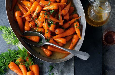 Add 1.5 cups of water & bring them to a simmer. Sweet roasted chantenay carrots | Tesco Real Food | Recipe ...