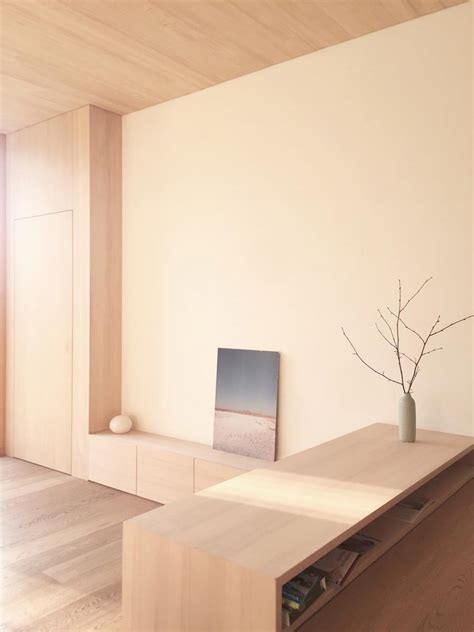 The Light Wood Used Throughout The Interior Of This Duplex Home Keeps