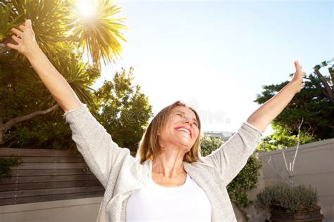 Smiling Older Woman With Arms Outstretched Stock Photo Image Of Life