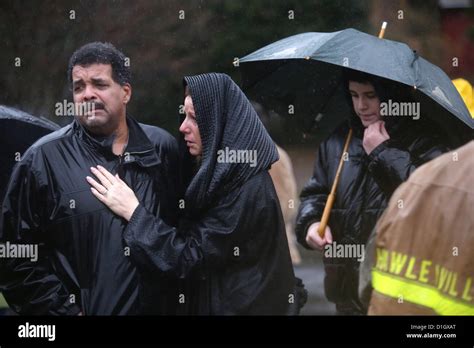 Newtown Connecticut Us Mourners Gather For A Moment Of Silence At 930am At The Entrance To