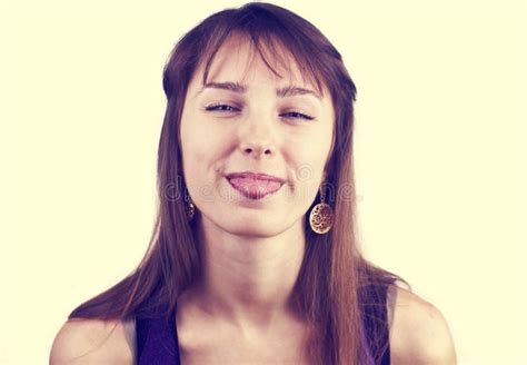 Portrait Of A Young Woman With Her Tongue Out Stock Image Image Of