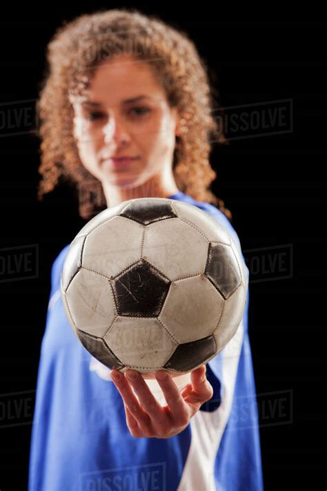 Caucasian Soccer Player Holding Ball Stock Photo Dissolve