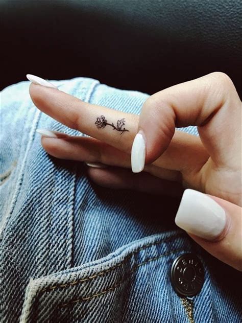 26 elegant finger tattoo ideas for females in 2023