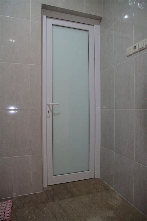 Karena dengan design kamar mandi yang elegan akan meningkatkan rasa nyaman untuk tinggal didalam hunian tersebut. Pintu UPVC Kamar Mandi, Pintu Panel UPVC, Pintu Kaca Kamar ...